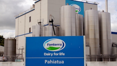 This Dec. 11, 2013 file photo shows a Fonterra milk powder factory at Pahiatua, New Zealand. An arbitration tribunal has ordered New Zealand dairy giant Fonterra to pay Danone of France US$125 million for recall costs stemming from a 2013 food scare.