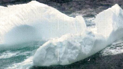 This March 2017 photo released by the U.S. Coast Guard and made by a robotic camera aboard a reconnaissance aircraft, shows icebergs floating near the Grand Banks of Newfoundland in the North Atlantic Ocean. The U.S. Coast Guard says about 1,000 icebergs drifted into the North Atlantic shipping lanes this year, marking the fourth consecutive 'extreme' ice season. The Connecticut-based Coast Guard International Ice Patrol monitors iceberg danger in the North Atlantic and warns ships. It held its annual meeting Thursday, Dec. 14 in New London, Conn., to discuss 2017 and look ahead to 2018.
