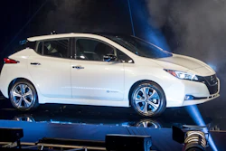Jose Munoz, the chairman of Nissan North America, presents the first 2018 Nissan Leaf produced at the Japanese automaker's sprawling plant in Smyrna, Tenn., Monday, Dec. 4, 2017.