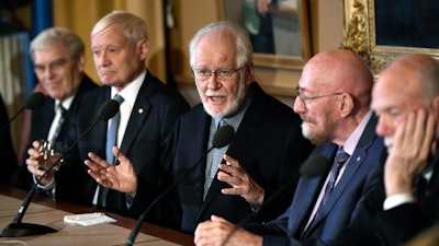 From left, Richard Henderson, Nobel Laureate in Chemistry, Joachim Frank, Nobel Laureate in Chemistry, Jacques Dubochet, Nobel Laureate in Chemistry, Kip Thorne, Nobel Laureate in Physics and Barry Barish, Nobel Laureate in Physics speak during a press conference at the Royal Academy of Science in Stockholm, Thursday Dec. 7, 2017.
