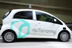 In this Wednesday, Aug. 24, 2016, file photo a nuTonomy autonomous vehicle is driven during its test drive in Singapore. Lyft and its Boston-based partner nuTonomy, which builds autonomous software, announced Wednesday, Dec. 6, 2017, that a pilot project has begun sending self-driving cars to pick up commuters in Boston's Seaport District, a burgeoning technology hub.