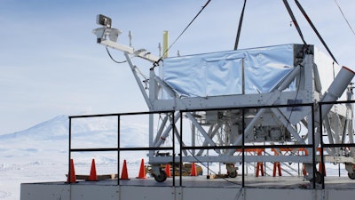 On Dec. 1, SuperTIGER was brought onto the deck of Payload Building 2 at McMurdo Station, Antarctica, to test communications in preparation for its second flight. Mount Erebus, the southernmost active volcano on Earth, appears in the background.