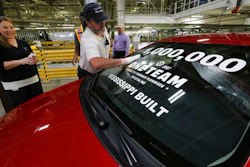 Brad Collins makes on last inspection and wipes down the car before a ceremony to celebrate the 1,000,000th Toyota Corolla to roll off the Toyota Motor Manufacturing Mississippi Plant, Tuesday, Dec. 12, 2017, in Blue Springs, Miss.