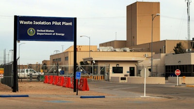 This March 6, 2014 file photo shows the idled Waste Isolation Pilot Plant, the nation's only underground nuclear waste repository, near Carlsbad, N.M. Officials at the nation's only underground nuclear waste repository are flipping the switch on an interim ventilation system this week, allowing mining to resume for the first time since a 2014 radiation release contaminated part of the facility.