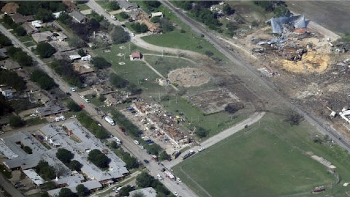 This April 18, 2013 aerial file photo shows the remains of a nursing home, left, apartment complex, center, and fertilizer plant, right, destroyed by an explosion at a fertilizer plant in West, Texas. Federal authorities announced Wednesday, May 11, 2016, that the fire that caused the deadly explosion in 2013 was a criminal act. The explosion killed 15 people, injured hundreds and left part of the small town in ruins.