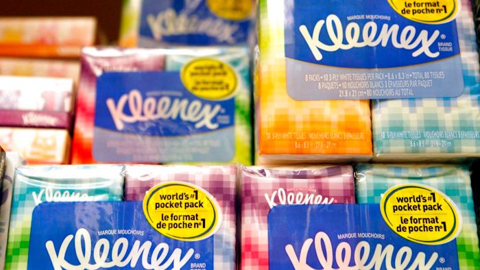 This Jan. 20, 2011, file photo shows packages of Kleenex tissues, a Kimberly Clark brand, at a store in San Francisco. Kimberly-Clark is cutting 5,000 to 5,500 jobs, or 12 percent to 13 percent of its workforce, as the consumer products company tries to lower costs.