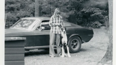 Sean's mom, Robbie Kiernan with family dog, Gatsby, alongside her daily driver in 1977 - the original Mustang from movie Bullitt.