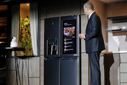 LG's David Vander Waal introduces the InstaView ThinQ smart refrigerator during a news conference at CES International, Monday, Jan. 8, 2018, in Las Vegas.
