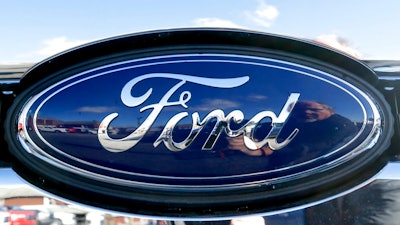 This Thursday, Nov. 19, 2015, file photo, shows the Ford badge in the grill of a pickup truck. Ford is telling owners of about 2,900 2006 Ranger pickup trucks not to drive them after discovering that a man was killed in a wreck involving an exploding Takata air bag inflator. The death occurred July 1, 2017, in West Virginia.