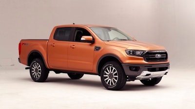 This Jan. 5, 2018, photo, shows the 2019 Ford Ranger truck on display in Warren, Mich. Ford is unveiling the North American version of the Ranger on Sunday, Jan. 14, ahead of the Detroit auto show. It goes on sale next spring, eight years after Ford pulled it off the market in the U.S. and Canada.