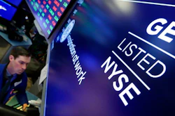 Specialist John McNierney works at the post that handles General Electric on the floor of the New York Stock Exchange, Tuesday, Jan. 16, 2018. GE CEO John Flannery, who was put in charge of reviving the company last summer, revealed significant issues at GE Capital on Tuesday, which will lead to a $6.2 billion after-tax charge in the fourth quarter.