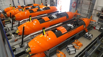 This undated handout picture released Wednesday, Jan. 10, 2018, by Ocean Infinity shows the Autonomous Underwater Vehicles (AUVs) which will be put in the ocean to search for the wreckage of the missing MH370 plane. Malaysia's government said Wednesday it will pay U.S. company Ocean Infinity up to $70 million if it can find the wreckage or black boxes of Malaysia Airlines Flight 370 within three months, in a renewed bid to solve the plane's disappearance nearly four years ago.