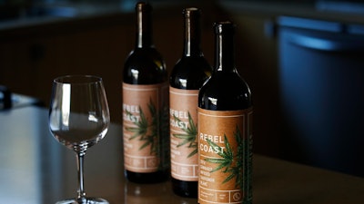 Three bottles of Rebel Coast Winery's cannabis-infused wine sit on a table in Los Angeles. As the world's largest legal recreational marijuana market takes off in California, the state is set to ignite the cannabis-culinary scene.
