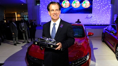 Henio Arcangeli Jr., Sr. Vice President Automobile Division for American Honda Motor Co., Inc, stands in front of the 2018 Honda Accord, which won the North American Car of the Year, at the North American International Auto Show, Monday, Jan. 15, 2018, in Detroit.