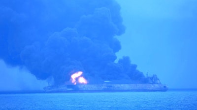 In this photo provided by Korea Coast Guard, the Panama-registered tanker 'Sanchi' is seen ablaze after a collision with a Hong Kong-registered freighter off China's eastern coast Sunday, Jan. 7, 2018. The oil tanker collided with a bulk freighter and caught fire off China's eastern coast, leaving its entire crew of 32 missing, most of them Iranians, authorities said.