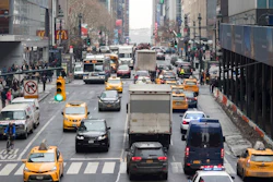 In this Jan. 11, 2018 file photo, traffic makes it's way across 42nd Street in New York City. Motorists would have to shell out $11.52 to drive into the busiest parts of Manhattan under a new proposal commissioned by Democratic Gov. Andrew Cuomo to ease traffic congestion and raise vital funds for mass transit. Trucks would pay even more — $25.34 — while taxi cabs, Uber rides and for-hire vehicles would be charged between $2 and $5 per ride.