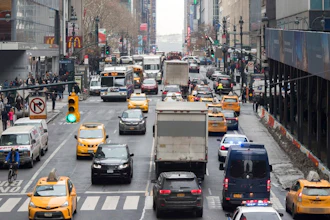 In this Jan. 11, 2018 file photo, traffic makes it's way across 42nd Street in New York City. Motorists would have to shell out $11.52 to drive into the busiest parts of Manhattan under a new proposal commissioned by Democratic Gov. Andrew Cuomo to ease traffic congestion and raise vital funds for mass transit. Trucks would pay even more — $25.34 — while taxi cabs, Uber rides and for-hire vehicles would be charged between $2 and $5 per ride.