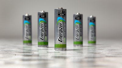 This Feb. 2, 2015, file photo shows examples of new Energizer EcoAdvanced batteries, at the company's headquarters in St. Louis. Energizer will spend about $2 billion to acquire the battery and lighting assets of Spectrum, adding the Rayovac brand to its battery and lighting division.