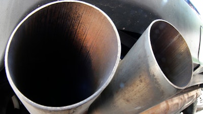 In this Aug. 2, 2017 file photo the exhaust pipes of a VW Diesel car are photographed in Frankfurt, Germany. The chairman of Volkswagen says that diesel exhaust tests involving monkeys were 'totally incomprehensible' and the matter must be 'investigated fully and unconditionally.' Monday's comments by Hans Dieter Poetsch, reported by the dpa news agency, come in the wake of a report by the New York Times that a research group funded by auto companies exposed monkeys to diesel exhaust from a late-model Volkswagen, while another group was exposed to fumes from an older Ford pickup.