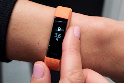 In this March 1, 2017, file photo, Fitbit's new Alta HR device is displayed in New York. The Pentagon is doing a broad review of how military forces use exercise trackers and other wearable electronic devices in the wake of revelations that an interactive, online map can pinpoint troop locations, bases and other sensitive areas around the world.