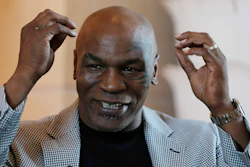 In this May 4, 2017 file photo, Mike Tyson speaks during an interview with The Associated Press, in Dubai, United Arab Emirates. Former heavyweight champion Tyson is becoming a California marijuana entrepreneur. TheBlast.com reports that Tyson and partners on Dec. 20, 2017, broke ground on a plot for a cannabis resort in California City, a remote Mojave Desert town that's about a 110-mile drive north of Los Angeles.
