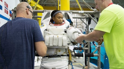 In this Sept. 16, 2014 photo provided by NASA, astronaut Jeanette Epps participates in a spacewalk training session at the Johnson Space Center in Houston. In June 2018, Epps was supposed to be the first African-American to live on the International Space Station, but on Thursday, Jan. 18, 2018, NASA announced it was pulling her off the mission for undisclosed reasons.