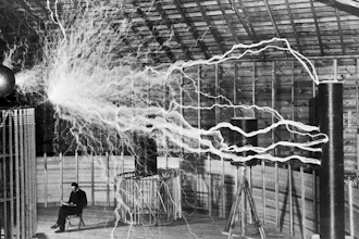 The inventor at rest, with a Tesla coil (thanks to a double exposure).