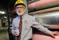 In a Dec. 20, 2017 photo, Jerome Malmquist, the University of Minnesota's energy management director, points out steam pipes during a tour of the new Main Energy Plant in Minneapolis. The plant is designed to be efficient and save the university about $2 million in utility costs.