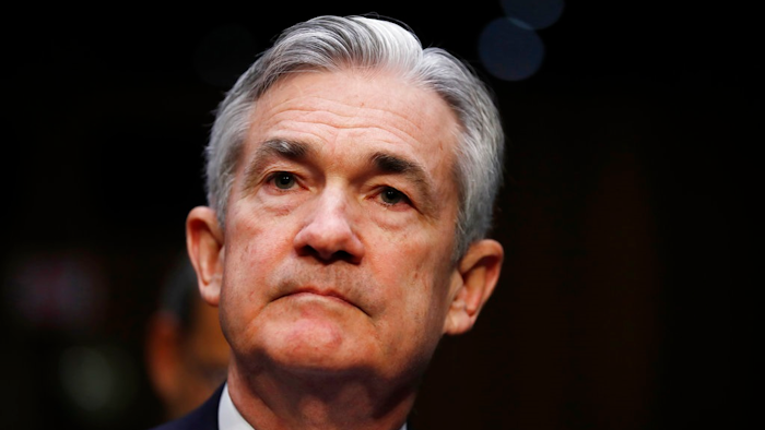 In this Nov. 28, 2017, file photo, Jerome Powell, President Donald Trump's nominee for chairman of the Federal Reserve, sits in the audience before being called to testify during a Senate Banking, Housing, and Urban Affairs Committee confirmation hearing on Capitol Hill in Washington. Powell testifies to Congress on Tuesday, Feb. 27, 2018, in his first public appearance as chairman of the Federal Reserve.