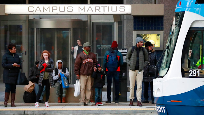 In this Jan. 26, 2018 photo, passengers wait on the QLINE transit train in Detroit. Some cities and regions are dangling racial diversity along with positive business climates, competitive tax rates and available land in pitches to lure tech companies and high-paying jobs to town. Places such as Pittsburgh, Philadelphia and Detroit are touting their populations of people of color to chief executives and other corporate officials as part of being open for business.