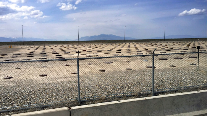In this May 11, 2015, file photo, nuclear waste is stored in underground containers at the Idaho National Laboratory near Idaho Falls, Idaho. A federal judge says the U.S. Department of Energy doesn't need to make public documents involving spent commercial nuclear fuel shipments to eastern Idaho sought by former Idaho Gov. Cecil Andrus.