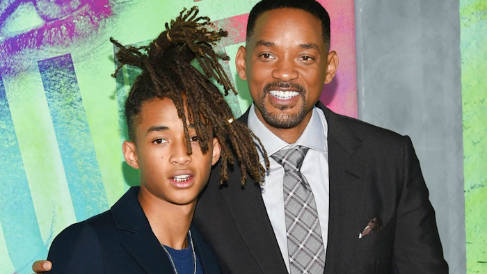 In this Aug. 1, 2016 file photo, Jaden Smith, left, and his father Will Smith attend the world premiere of 'Suicide Squad' in New York. The Smiths have founded an eco-friendly bottled-water company called Just, which is unveiling a new line of flavored waters next month.