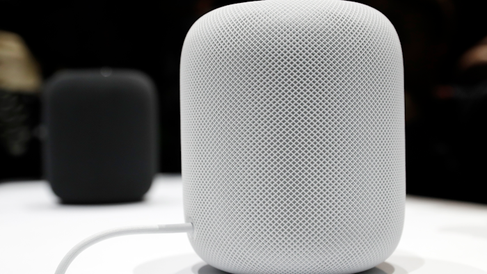 This June 5, 2017, file photo shows the HomePod speaker in a showroom during an announcement of new products at the Apple Worldwide Developers Conference in San Jose, Calif. Apple's new internet-connected speaker is proving to be more appealing to the ears than to the eyes, depending on where the device is placed. Some people who bought the just-released $349 speaker, dubbed the HomePod, are reporting that it leaves a white ring on the surfaces of wooden furniture. In an explanation posted Wednesday, Feb. 14, 2018, Apple said the problem occurs with speakers that, like the HomePod, are equipped with a silicon base to minimize vibration.