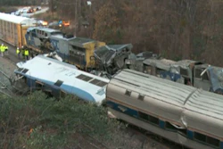 Train cars are smashed and derailed Sunday, Feb. 4, 2018 near Cayce. S.C. The crash left multiple people dead and dozens of people injured.