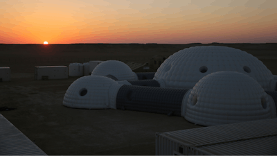 The sun rises over a 2.4-ton inflated habitat used by the AMADEE-18 Mars simulation in the Dhofar desert of southern Oman on Thursday, Feb. 8, 2018. The desolate desert in southern Oman resembles Mars so much that more than 200 scientists from 25 nations organized by the Austrian Space Forum are using it for the next four weeks to field-test technology for a manned mission to Mars.