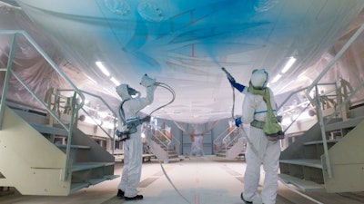 An A350-900 for delivery to Air Caraïbes receives its special livery inside Airbus’ Toulouse, France paint shop