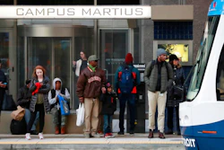 In this Jan. 26, 2018 photo, passengers wait on the QLINE transit train in Detroit. Some cities and regions are dangling racial diversity along with positive business climates, competitive tax rates and available land in pitches to lure tech companies and high-paying jobs to town. Places such as Pittsburgh, Philadelphia and Detroit are touting their populations of people of color to chief executives and other corporate officials as part of being open for business.
