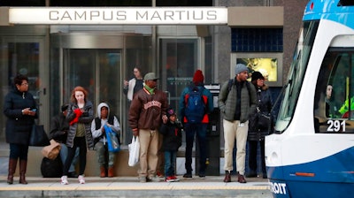 In this Jan. 26, 2018 photo, passengers wait on the QLINE transit train in Detroit. Some cities and regions are dangling racial diversity along with positive business climates, competitive tax rates and available land in pitches to lure tech companies and high-paying jobs to town. Places such as Pittsburgh, Philadelphia and Detroit are touting their populations of people of color to chief executives and other corporate officials as part of being open for business.