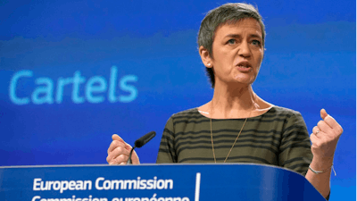 European Commissioner for Competition Margrethe Vestager speaks during a media conference at EU headquarters in Brussels on Wednesday, Feb. 21, 2018. The European Union's anti-trust watchdog is sounding the warning to business cartels by announcing fines totaling more than half a billion euros (600 million US dollars) in three anti-trust cases.