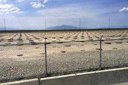 In this May 11, 2015, file photo, nuclear waste is stored in underground containers at the Idaho National Laboratory near Idaho Falls, Idaho. A federal judge says the U.S. Department of Energy doesn't need to make public documents involving spent commercial nuclear fuel shipments to eastern Idaho sought by former Idaho Gov. Cecil Andrus.