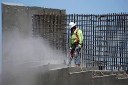 In this May 19, 2017, file photo, a man works on the Southern Nevada portion of U.S. Interstate 11 near Boulder City, Nev. President Donald Trump on Monday, Feb. 12, 2018, will unveil his long-awaited infrastructure plan, a $1.5 billion proposal that fulfills a number of campaign goals, but relies heavily on state and local governments to produce much of the funding. The administration’s plan is centered on using $200 billion in federal money to leverage local and state tax dollars to fix America's infrastructure, such as roads, highways, ports and airports.