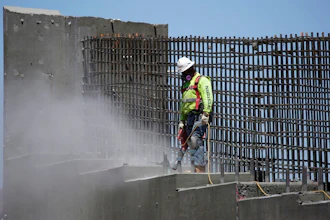 In this May 19, 2017, file photo, a man works on the Southern Nevada portion of U.S. Interstate 11 near Boulder City, Nev. President Donald Trump on Monday, Feb. 12, 2018, will unveil his long-awaited infrastructure plan, a $1.5 billion proposal that fulfills a number of campaign goals, but relies heavily on state and local governments to produce much of the funding. The administration’s plan is centered on using $200 billion in federal money to leverage local and state tax dollars to fix America's infrastructure, such as roads, highways, ports and airports.