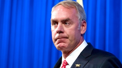 In this Sept. 29, 2017, file photo, Interior Secretary Ryan Zinke speaks about the Trump Administration's energy policy at the Heritage Foundation in Washington. A second federal judge has rejected the Trump administration's efforts to delay an Obama-era regulation aimed at restricting harmful methane emissions from oil and gas production on federal lands.