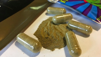 In this Sept. 27, 2017 photo, kratom capsules are displayed in Albany, N.Y. U.S. health authorities say kratom, a herbal supplement promoted as an alternative pain remedy, contains the same chemicals found in opioids, the addictive family of drugs at the center of a national drug abuse crisis. The Food and Drug Administration analysis, published Tuesday, Feb. 6, 2018, makes it more likely that kratom could be banned by the federal government.