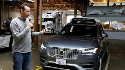 In this photo taken Tuesday, Dec. 13, 2016, file photo, Anthony Levandowski, then-head of Uber's self-driving program, speaks about their driverless car in San Francisco. A Google-bred pioneer in self-driving cars will collide with Uber's beleaguered ride-hailing service in a courtroom showdown Monday, Feb. 4, 2018, revolving around allegations of deceit, betrayal, espionage and a high-tech heist that tore apart one-time allies.