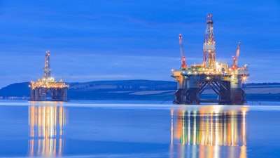 Semi Submersible Oil Rig During Sunrise 619658356 5616x3744