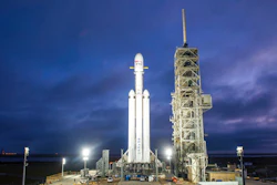 This Dec. 28, 2017 photo made available by SpaceX shows a Falcon Heavy rocket in Cape Canaveral, Fla. With more than 5 million pounds of liftoff thrust the Heavy will be capable of lifting super-size satellites into orbit and sending spacecraft to the moon, Mars and beyond.