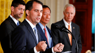 Wisconsin Gov. Scott Walker announces a deal with Taiwanese electronics giant, Foxconn, last July.