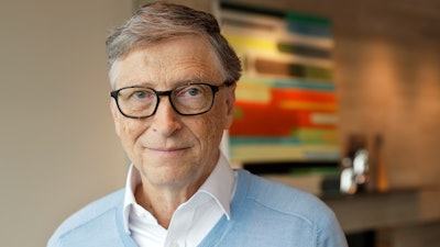 In this Feb. 1, 2018 photo, Microsoft co-founder Bill Gates, with his wife Melinda, poses for a photo before an interview with The Associated Press in Kirkland, Wash. The Gateses, as the world's top philanthropists, are rethinking their work in America as they confront what they consider their unsatisfactory track record on schools, the country's growing inequity and a president they disagree with more than any other.