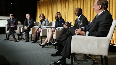 Larry Fink, right, shared a stage with several of the CEOs he urged to spend more time doing good.